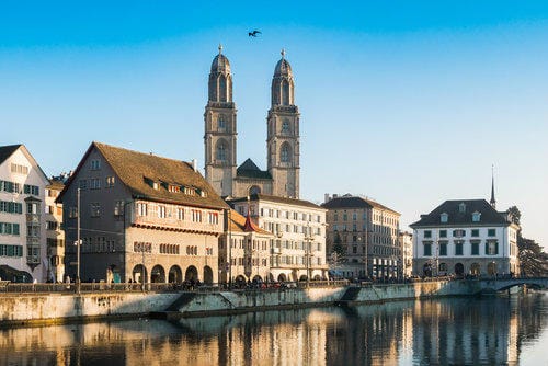 Limmat river quay and Grossmünster church