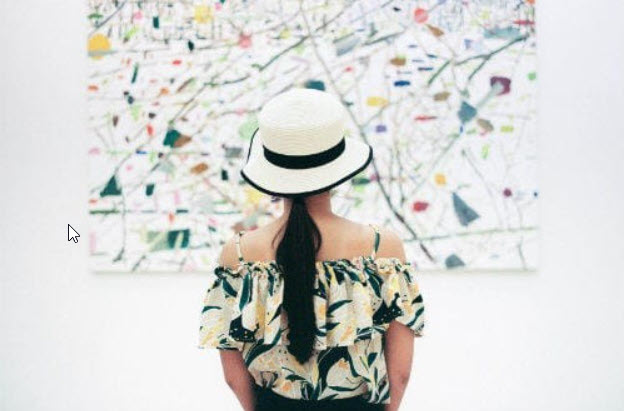 Everything about Eurail | Female appreciating a painting in a museum