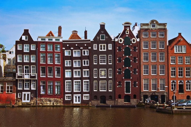 Dutch buildings and canal in Amsterdam, the Netherlands