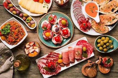 spanish_tapas_on_wooden_table_2