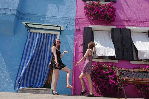 Everything about Eurail | Two girls being silly in Burano, Venice, Italy